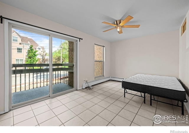1065 University Ave Unit 121, Boulder, CO 80302 - dining space with a ceiling fan, a baseboard radiator, and light tile patterned floors