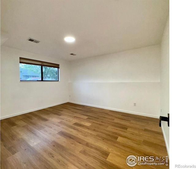517 46th Ave, Greeley, CO 80634 - empty room featuring wood finished floors and baseboards