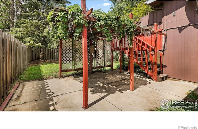 517 46th Ave, Greeley, CO 80634 - fenced backyard featuring a patio