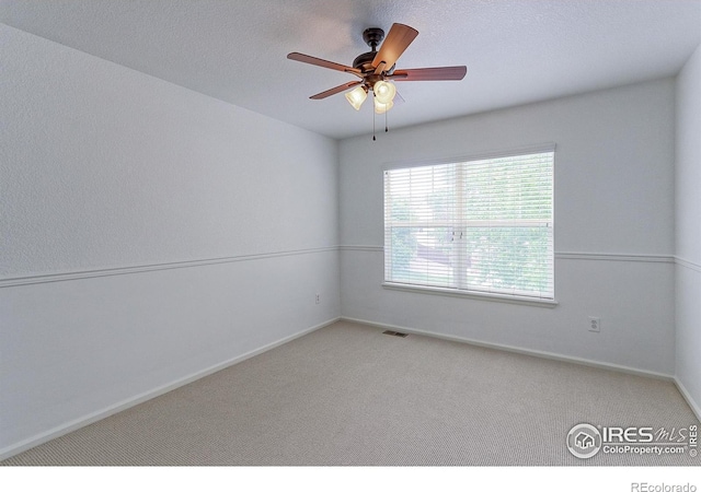 2631 E 136th Pl, Thornton, CO 80602 - carpeted empty room featuring ceiling fan, baseboards, and a textured ceiling