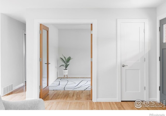 3445 Martin Dr, Boulder, CO 80305 - corridor with wood finished floors and baseboards
