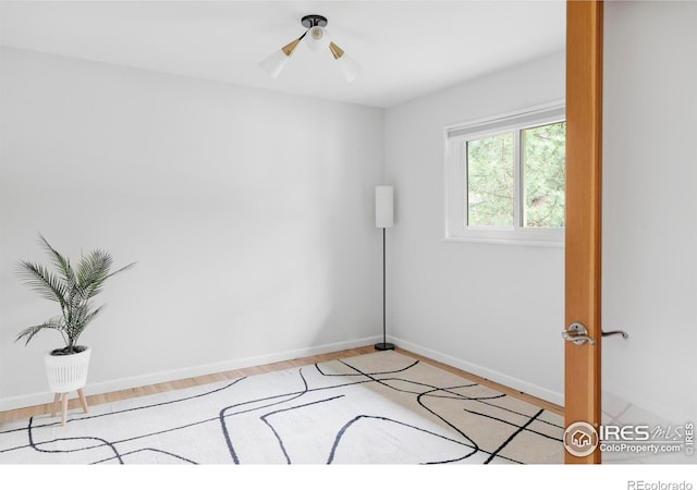 3445 Martin Dr, Boulder, CO 80305 - unfurnished room with light wood-style flooring, baseboards, and a ceiling fan