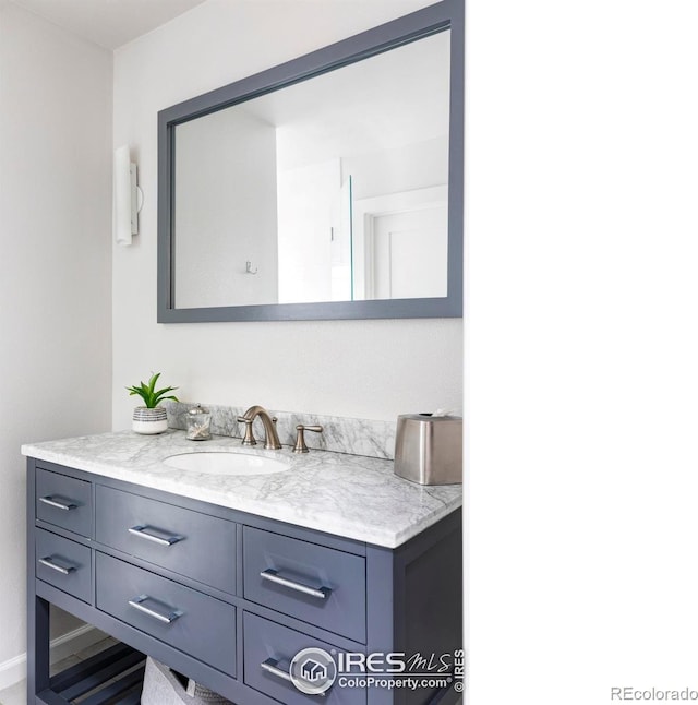 3445 Martin Dr, Boulder, CO 80305 - bathroom featuring vanity and baseboards