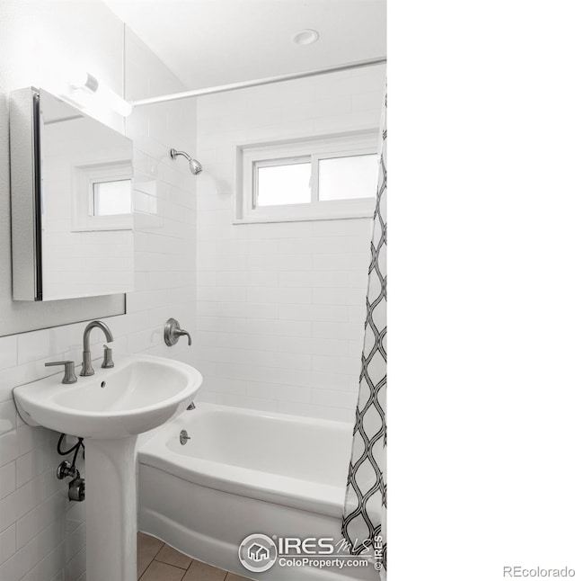 3445 Martin Dr, Boulder, CO 80305 - bathroom with shower / tub combo and tile patterned flooring