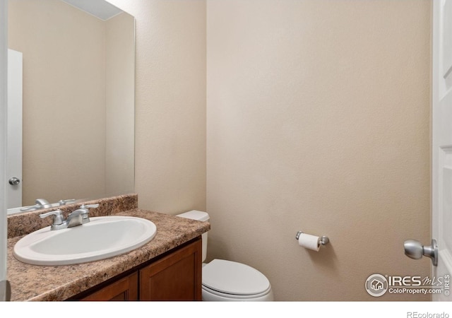 6340 Spring Valley Rd, Timnath, CO 80547 - bathroom featuring vanity and toilet