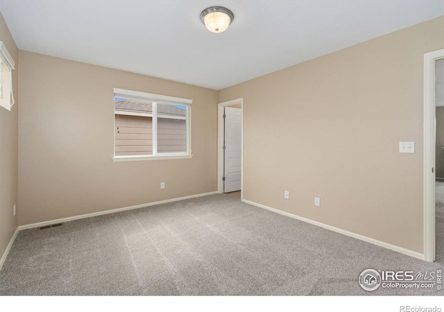 6340 Spring Valley Rd, Timnath, CO 80547 - spare room with carpet flooring and baseboards