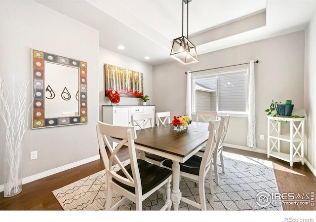 5512 Bristow Rd, Timnath, CO 80547 - dining area with wood finished floors, baseboards, and recessed lighting
