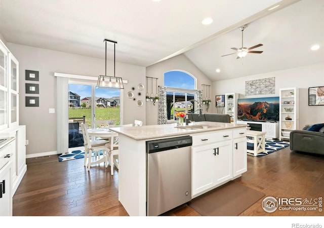 5512 Bristow Rd, Timnath, CO 80547 - kitchen with dishwasher, open floor plan, dark wood-type flooring, ceiling fan, and lofted ceiling