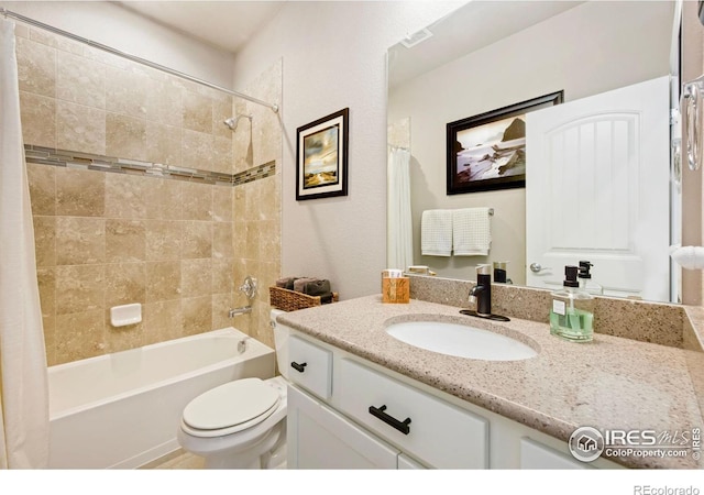 5512 Bristow Rd, Timnath, CO 80547 - full bathroom with vanity, toilet, and shower / bath combo with shower curtain