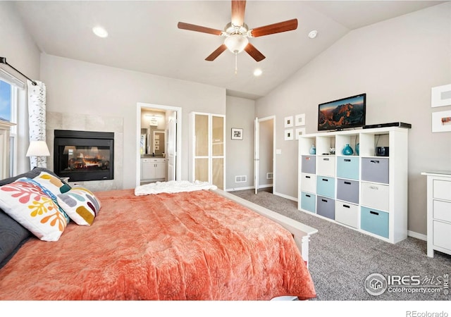 5512 Bristow Rd, Timnath, CO 80547 - unfurnished bedroom with lofted ceiling, carpet flooring, baseboards, a fireplace, and recessed lighting