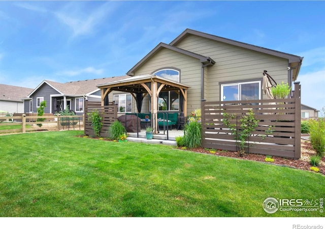 5512 Bristow Rd, Timnath, CO 80547 - rear view of property with a patio and a gazebo
