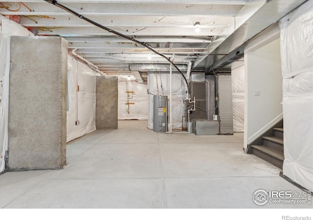 645 Flintwood Pl, Lafayette, CO 80026 - unfinished below grade area with electric water heater and stairs