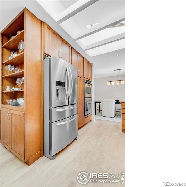 205 Lipan Way, Boulder, CO 80303 - kitchen with stainless steel appliances, light wood-type flooring, open shelves, light countertops, and hanging light fixtures