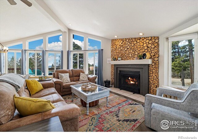 1954 Bluestem Way, Fairplay, CO 80440 - living area with a fireplace with flush hearth, a ceiling fan, and wood finished floors