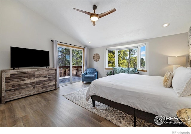 1954 Bluestem Way, Fairplay, CO 80440 - bedroom featuring access to exterior, vaulted ceiling, wood finished floors, a ceiling fan, and recessed lighting