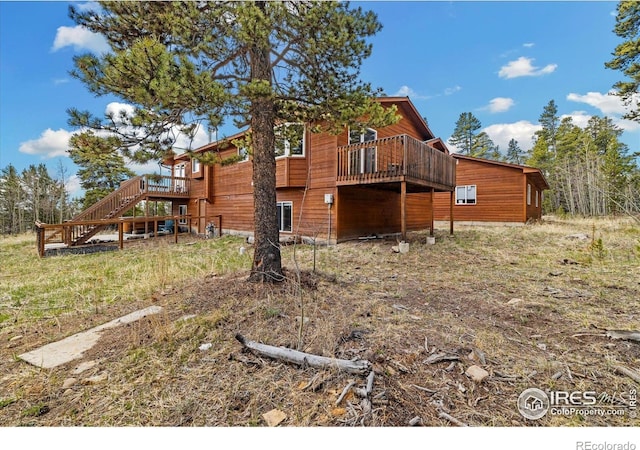 1954 Bluestem Way, Fairplay, CO 80440 - view of property exterior featuring a wooden deck and stairs