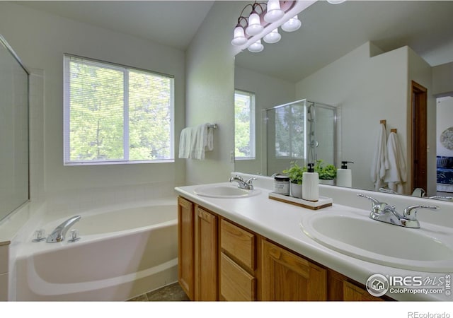804 Nelson Park Ln, Longmont, CO 80503 - full bathroom with a garden tub, double vanity, a stall shower, and tile patterned flooring