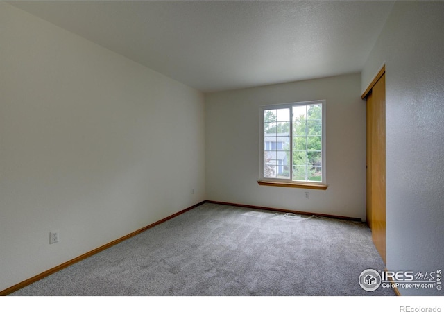 804 Nelson Park Ln, Longmont, CO 80503 - unfurnished room with carpet and baseboards