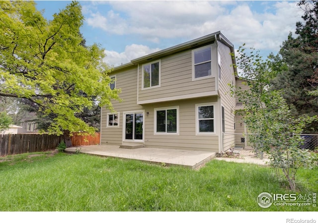 804 Nelson Park Ln, Longmont, CO 80503 - back of property featuring a patio area