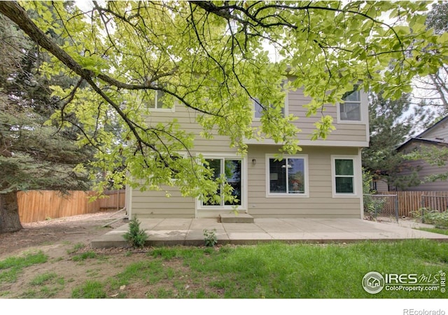 804 Nelson Park Ln, Longmont, CO 80503 - rear view of house with a patio area