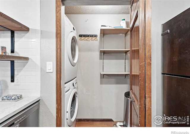 3255 34th St Unit 42, Boulder, CO 80301 - laundry room with stacked washer / dryer
