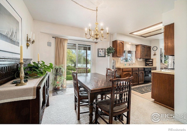 1702 Kennedy Ave, Loveland, CO 80538 - dining space with a chandelier