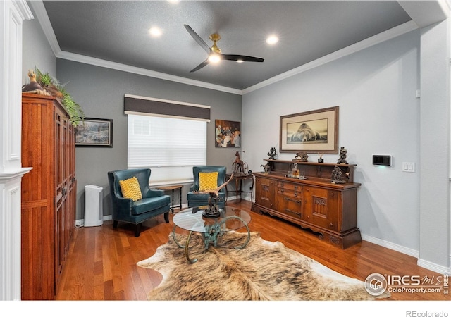 2038 Vineyard Dr, Windsor, CO 80550 - sitting room with ceiling fan, wood finished floors, crown molding, baseboards, and recessed lighting