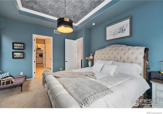 2038 Vineyard Dr, Windsor, CO 80550 - bedroom with an ornate ceiling, a raised ceiling, and carpet floors
