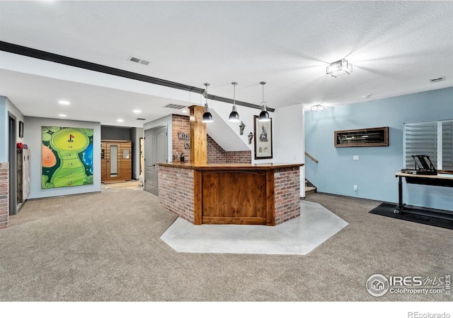 2038 Vineyard Dr, Windsor, CO 80550 - kitchen featuring carpet, open floor plan, a textured ceiling, recessed lighting, and pendant lighting