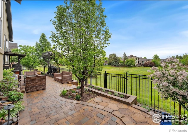 2038 Vineyard Dr, Windsor, CO 80550 - view of patio featuring an outdoor hangout area