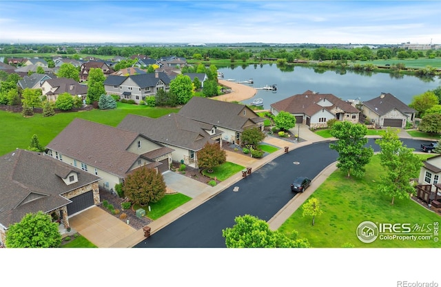 2038 Vineyard Dr, Windsor, CO 80550 - aerial perspective of suburban area featuring a nearby body of water