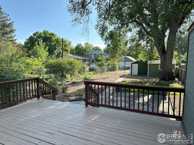 515 Cowan St, Fort Collins, CO 80524 - wooden deck with a fenced backyard and an outbuilding
