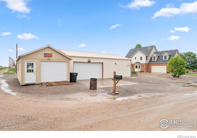36091 Appy Rd, Eaton, CO 80615 - view of front of property with an outdoor structure and a garage