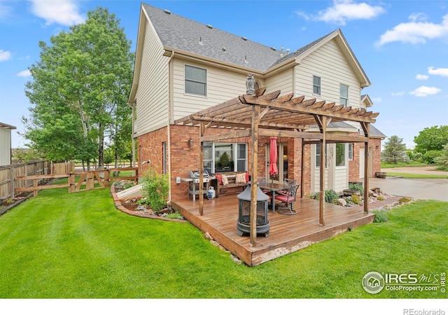 36091 Appy Rd, Eaton, CO 80615 - back of house with a wooden deck, brick siding, a pergola, and a shingled roof