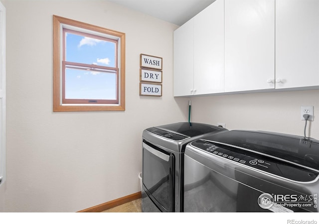 36091 Appy Rd, Eaton, CO 80615 - laundry room with cabinet space, washing machine and clothes dryer, and baseboards