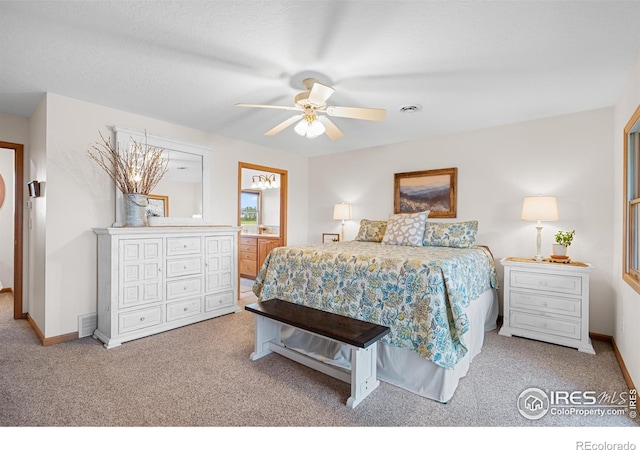 36091 Appy Rd, Eaton, CO 80615 - bedroom with carpet, baseboards, ensuite bath, and a ceiling fan