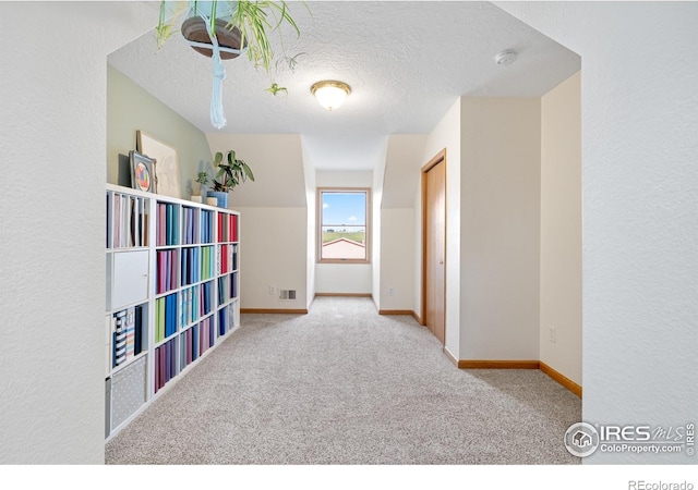 36091 Appy Rd, Eaton, CO 80615 - playroom featuring carpet, a textured ceiling, and baseboards