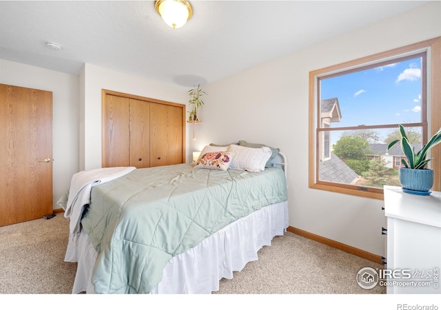 36091 Appy Rd, Eaton, CO 80615 - bedroom featuring carpet, a closet, and baseboards