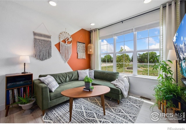 1922 Naturita St, Loveland, CO 80538 - living room with recessed lighting and baseboards