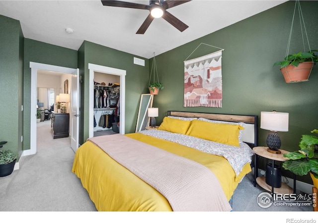 1922 Naturita St, Loveland, CO 80538 - bedroom featuring carpet floors, a closet, baseboards, a walk in closet, and ceiling fan