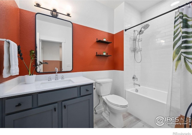 1922 Naturita St, Loveland, CO 80538 - full bath with toilet, vanity, shower / bath combination with curtain, and a textured wall