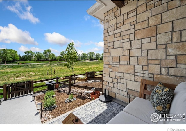 1922 Naturita St, Loveland, CO 80538 - view of patio / terrace with a rural view
