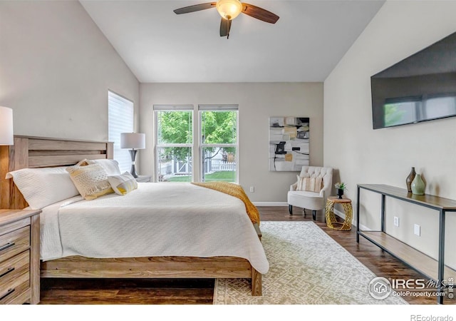 5111 Mt St Vrain Ave, Frederick, CO 80504 - bedroom with lofted ceiling, wood finished floors, a ceiling fan, and baseboards