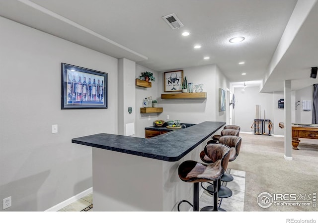 5111 Mt St Vrain Ave, Frederick, CO 80504 - indoor bar with recessed lighting, baseboards, and light colored carpet