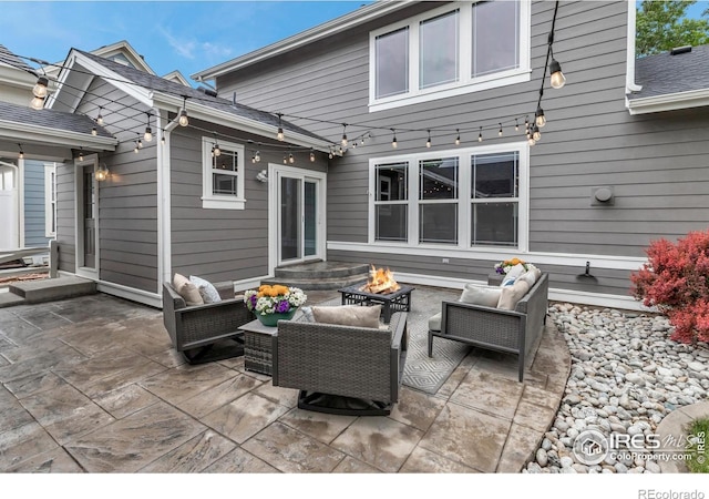 5111 Mt St Vrain Ave, Frederick, CO 80504 - view of patio / terrace with an outdoor living space with a fire pit