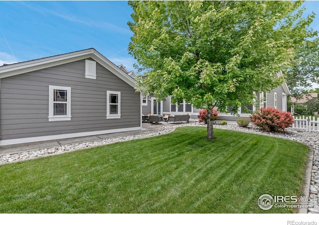 5111 Mt St Vrain Ave, Frederick, CO 80504 - view of yard with a patio area and an outdoor living space