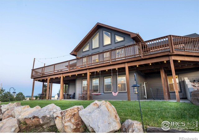 4721 Arthur Mae Ln, Laporte, CO 80535 - rear view of property with a deck and a yard
