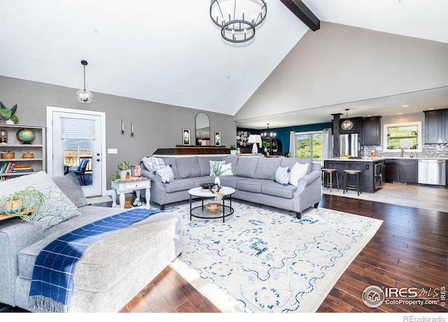 4721 Arthur Mae Ln, Laporte, CO 80535 - living area featuring a chandelier, high vaulted ceiling, hardwood / wood-style floors, and beamed ceiling