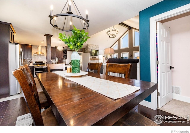 4721 Arthur Mae Ln, Laporte, CO 80535 - dining room featuring a chandelier, hardwood / wood-style floors, and lofted ceiling
