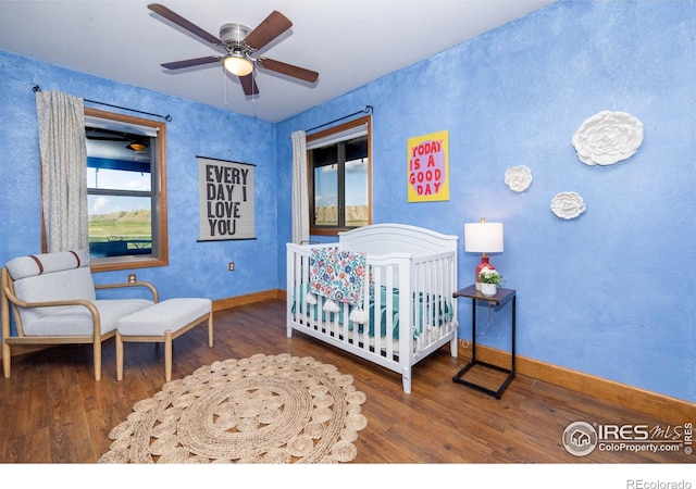 4721 Arthur Mae Ln, Laporte, CO 80535 - bedroom featuring wood finished floors and baseboards